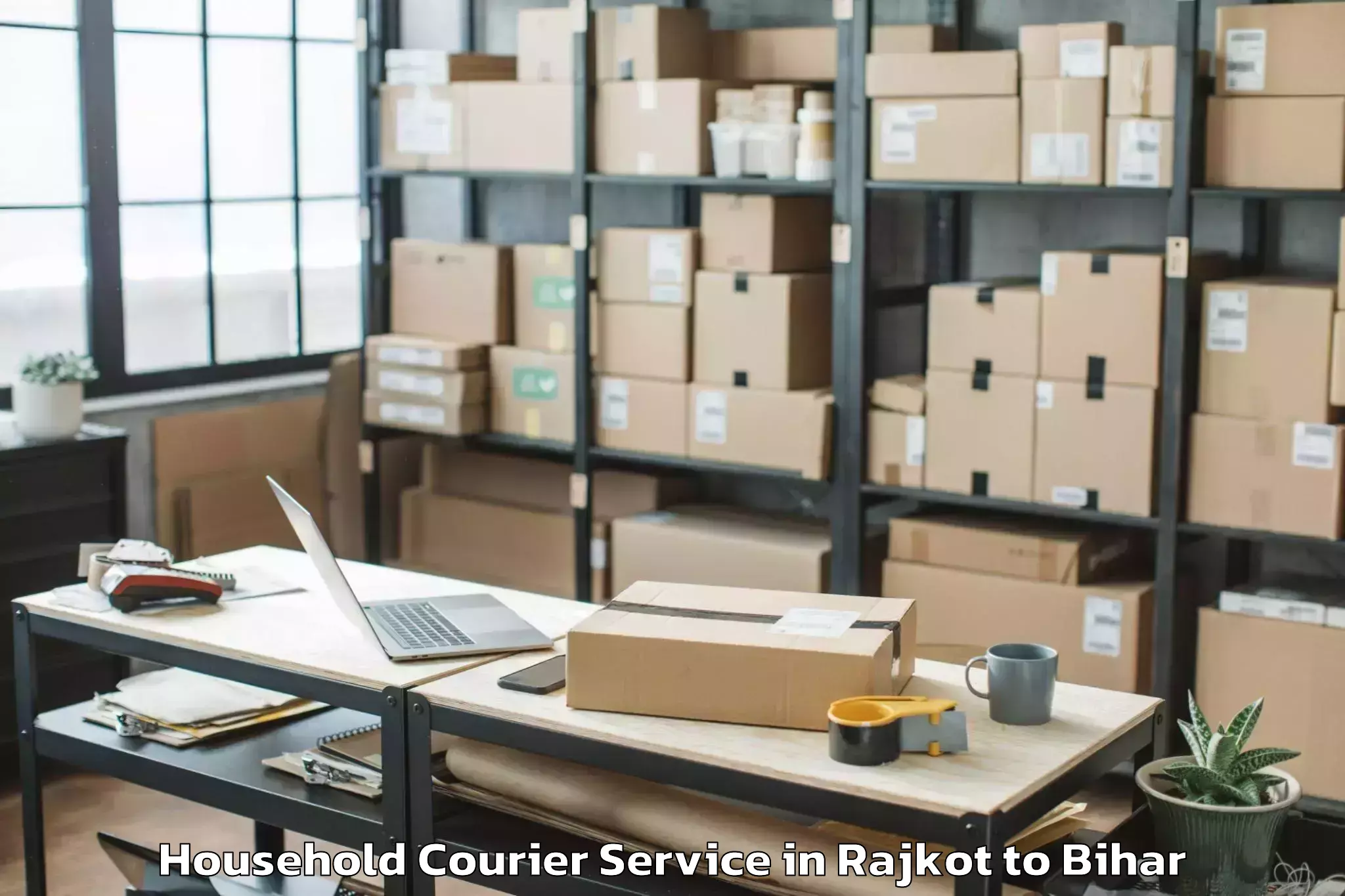 Quality Rajkot to Ghanshampur Household Courier